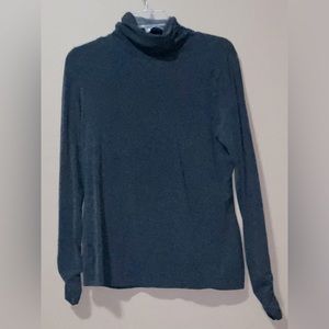 Turtleneck knit top with rouched sleeves